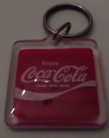 93113-1 € 1,50. coca cola sleutelhanger rood wit